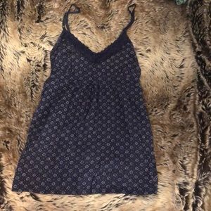 Navy blue tank with waist tie and white design